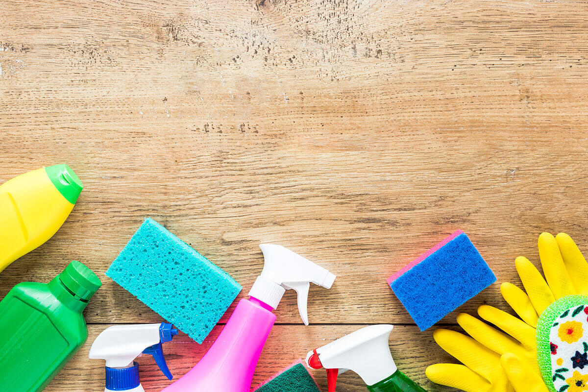 top-view-frame-with-cleaning-products-wooden-background (1) (1) (1)